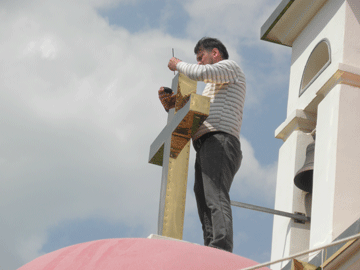 Polishing the Gold Cross